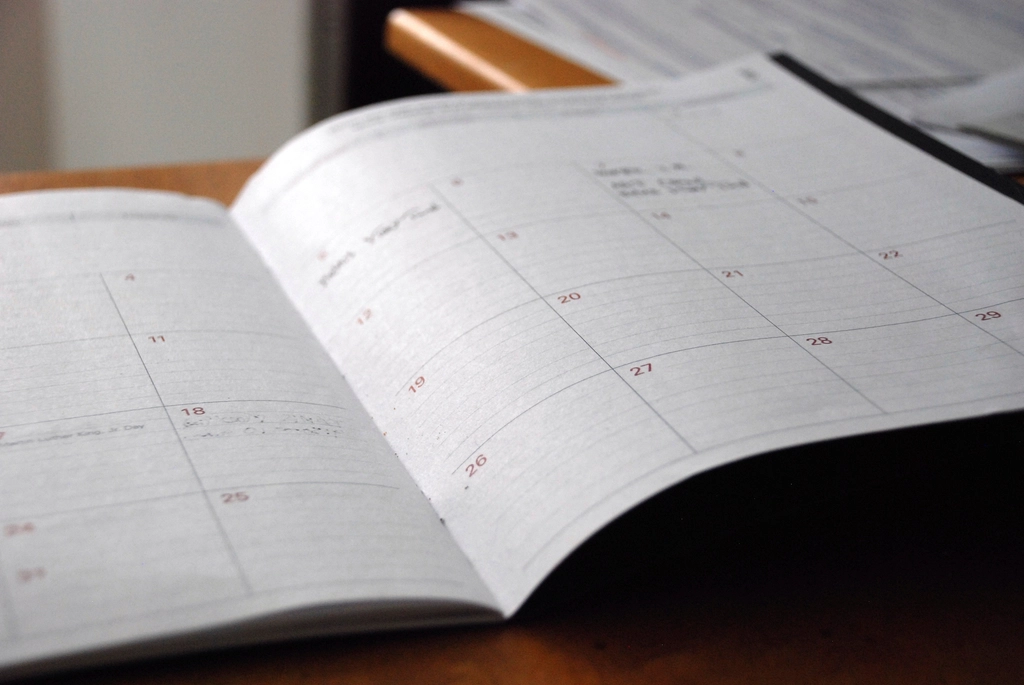 open calendar short notes scribbled